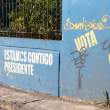 Election graffiti, fancy script. Quito.