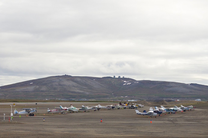 View of Nome from airport showing landmark DEW line (1950s radar network across the north) structures against the sky.