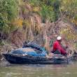 ManInRiverboat_OM01507