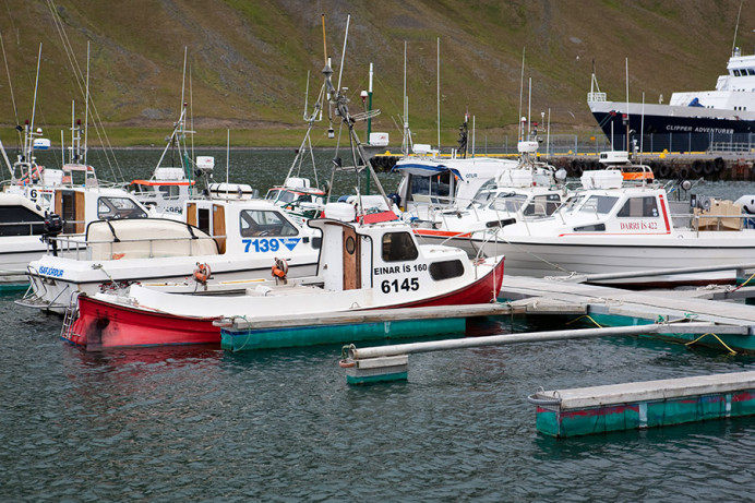 Einar Boat in Isafjordur harbor (northwest Iceland); Clipper Adventurer in background.