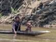WomanInfantInCanoe_692x520_OM19428