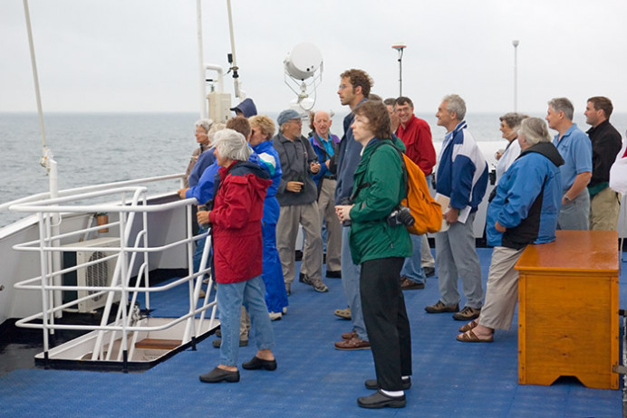 Birders on deck, off Land's End, Cornwall