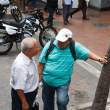 Conferring on the street. Guayaquil.