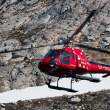 Medical evacuation helicopter leaving Napassorssuaq Fjord
